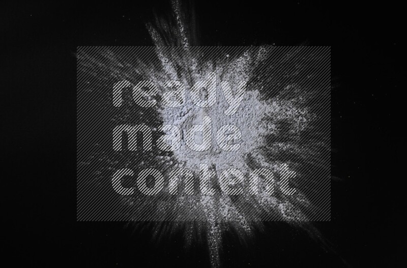 Blue powder on black background