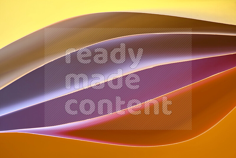 This image showcases an abstract paper art composition with paper curves in different warm gradients created by colored light