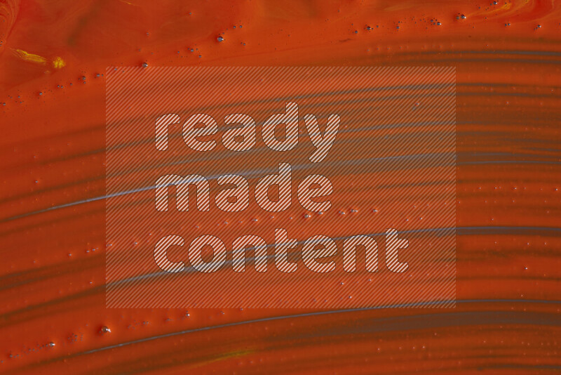 Close-ups of abstract orange paint texture in different shapes