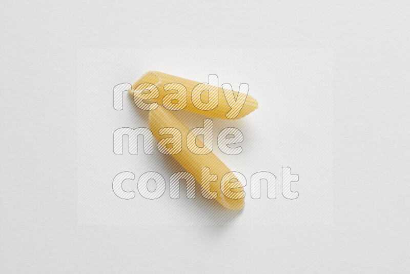 Penne pasta on white background