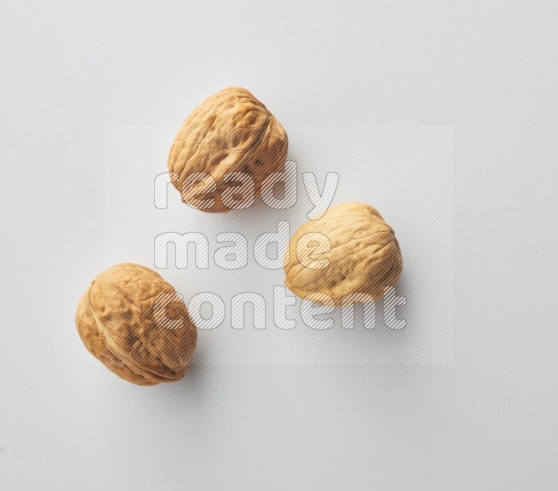 Top-view shot of walnut on white background