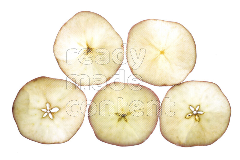 Apple slices on illuminated white background