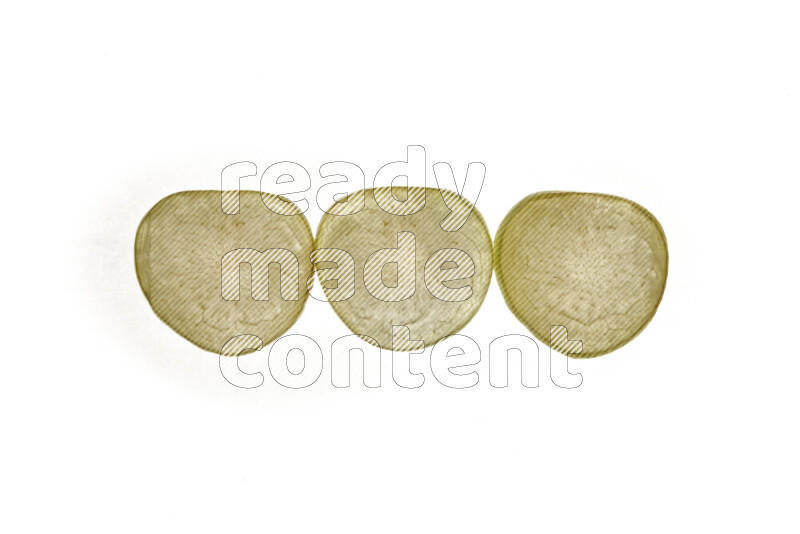 Plum slices on illuminated white background