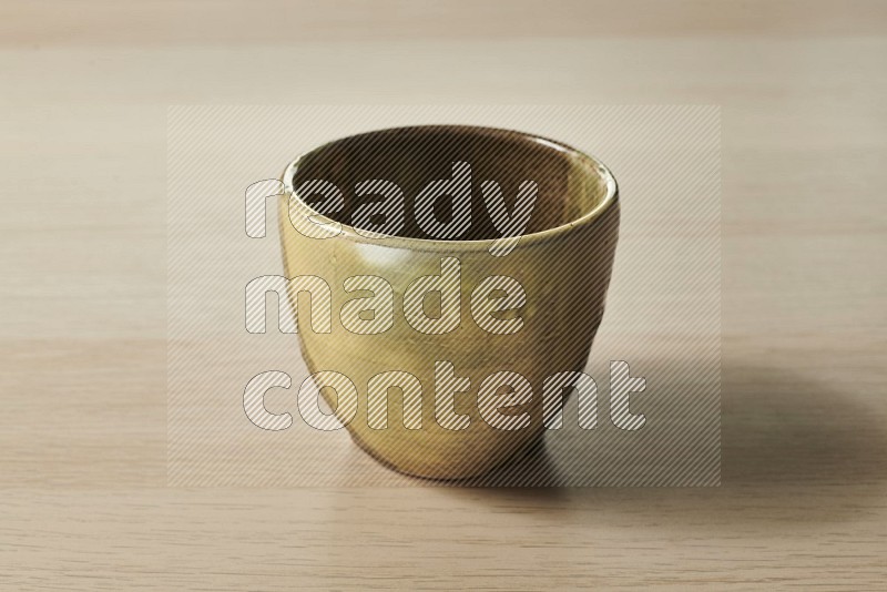 Multicolored Pottery Bowl on Oak Wooden Flooring, 15 degrees