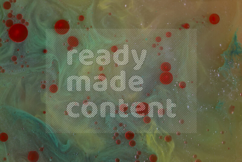 تلتقط الصورة تناثرا للطلاء الأحمر والأخضر والأصفر علي الخلفية