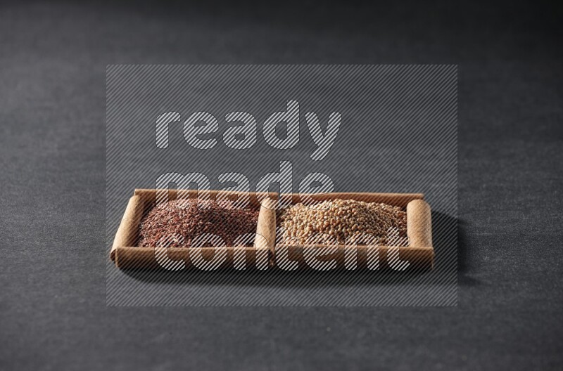 2 squares of cinnamon sticks full of mustard seeds and garden cress on black flooring