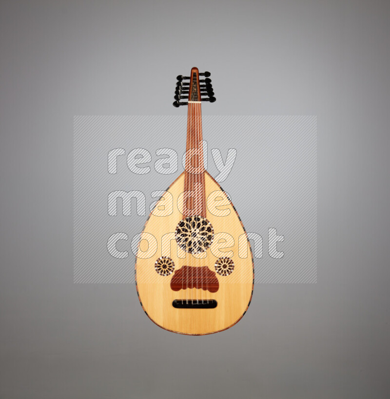 a wooden brown Oud on a gray background