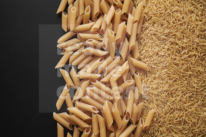 Different pasta types on black background