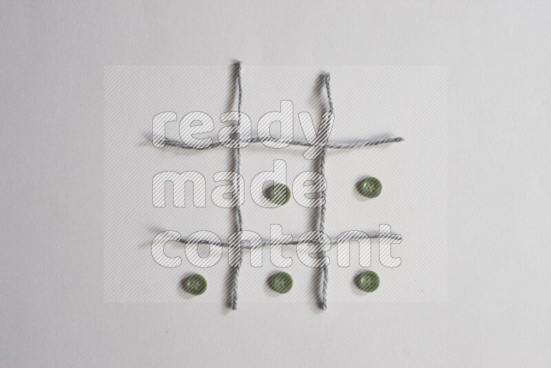 Green buttons placed on grey background