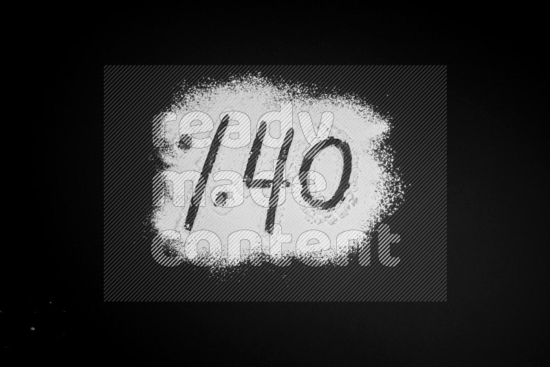 Percentages written with powder on black background