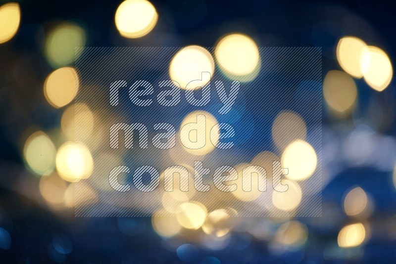 Bokeh light in yellow with blue background