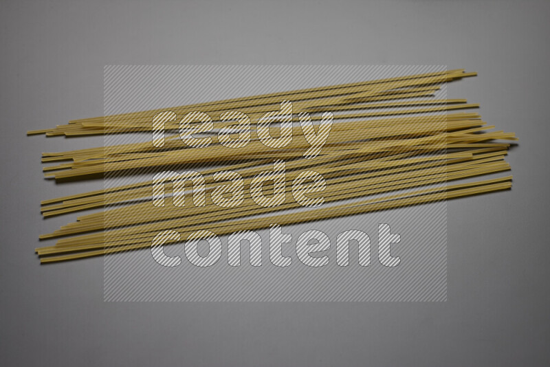 Spaghetti pasta on grey background