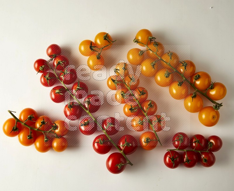 Mixed colors of cherry tomato veins topview on a white backgrounds