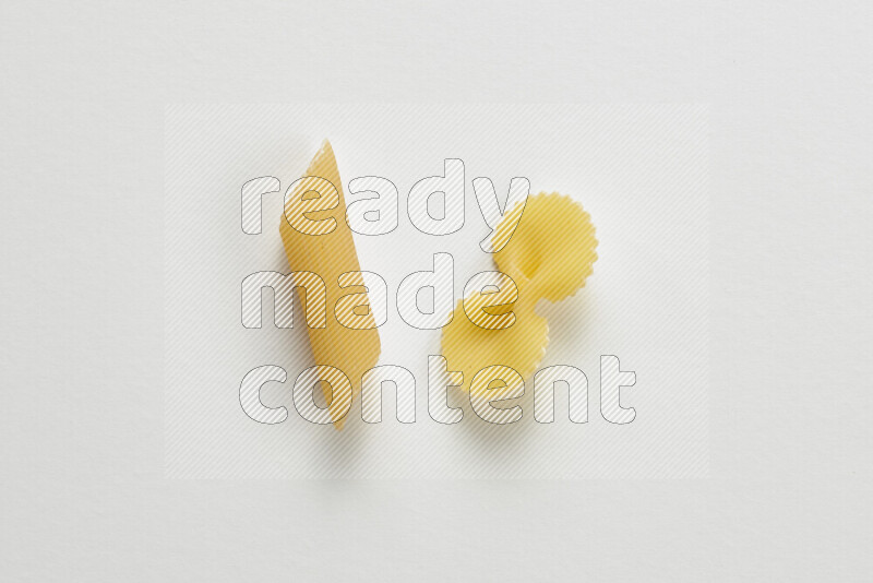 Different pasta types on white background