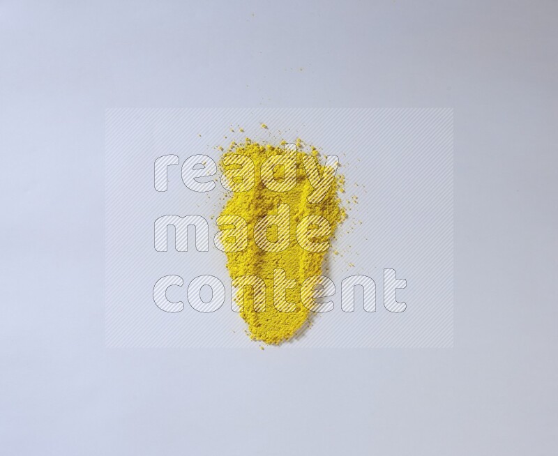 Yellow powder strokes on white background