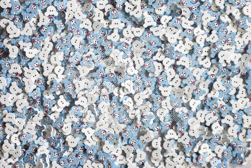 Multicolored buttons placed on grey background