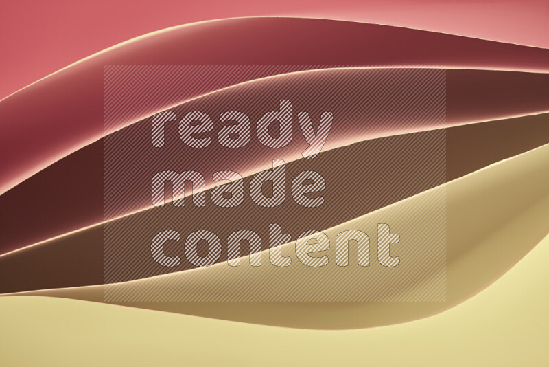 This image showcases an abstract paper art composition with paper curves in yellow, red and brown gradients created by colored light