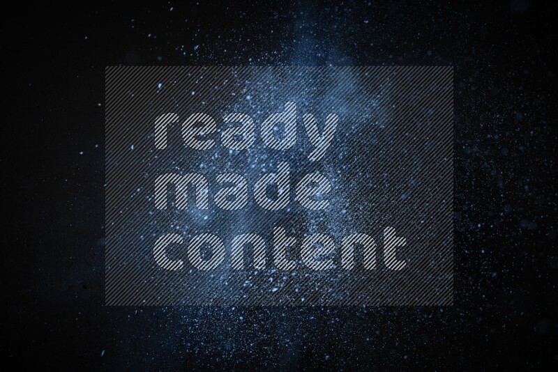 Blue powder explosion on black background