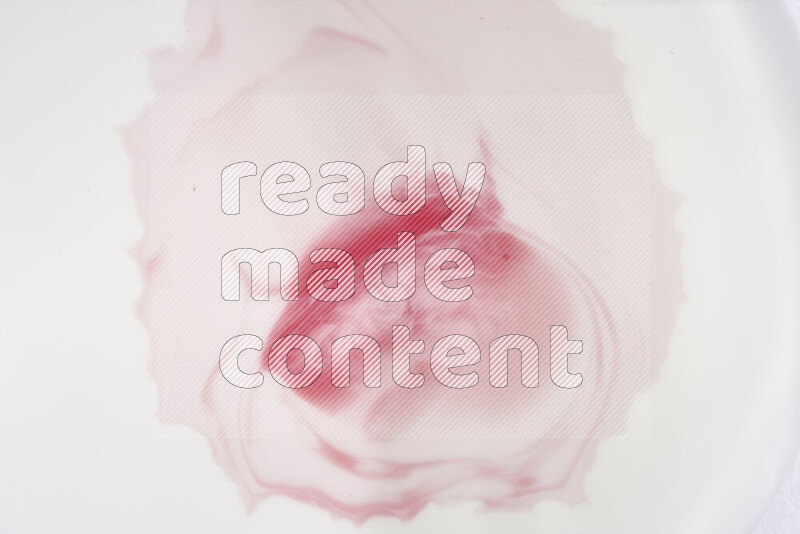 لقطة مقربة لأنماط دوامية باللون الأحمر والأبيض