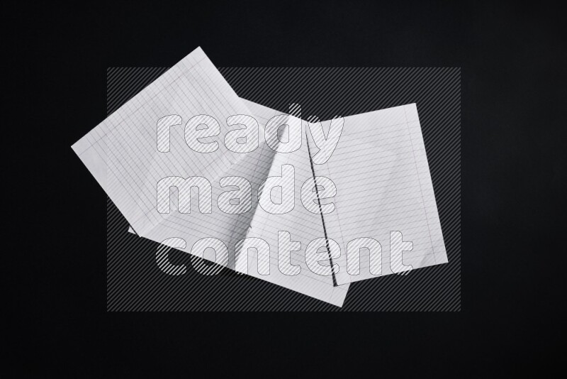 Notebook sheet on black background