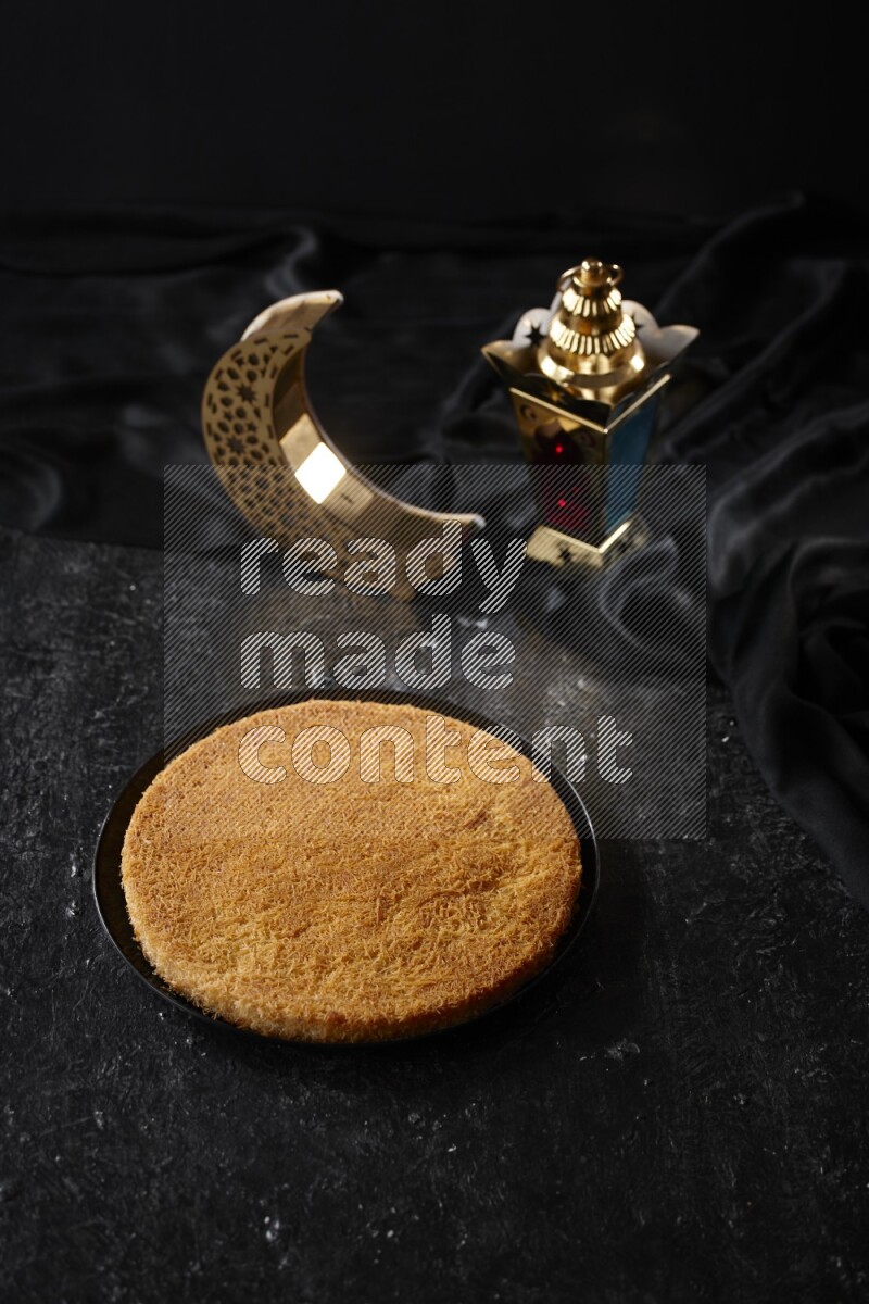 Konafa with lanterns in a dark setup