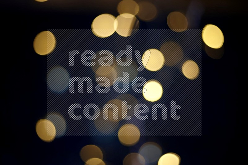 Bokeh light in yellow with blue background
