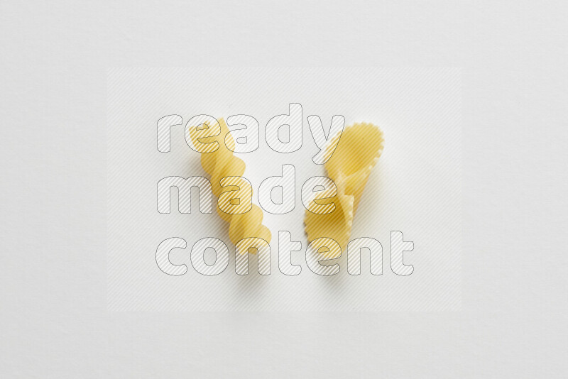 Different pasta types on white background