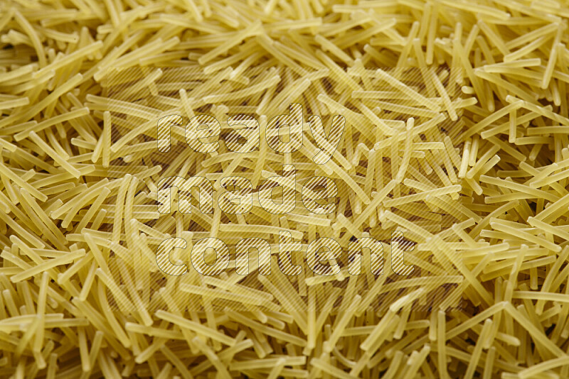 Vermicelli pasta on grey background