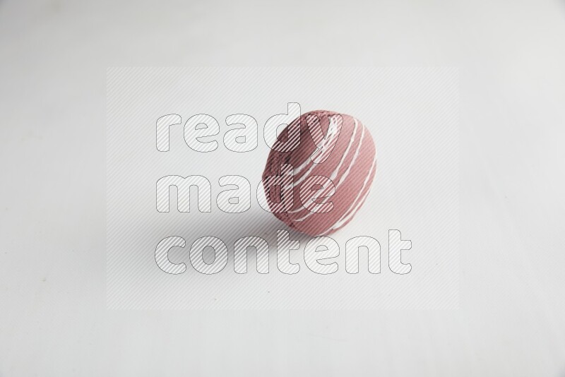 45º Shot of Red Poppy Flower macaron on white background