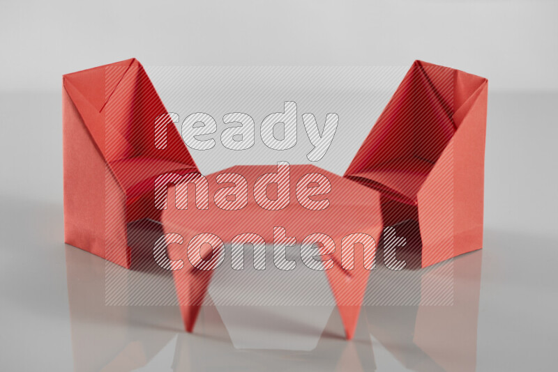 Origami dinning room on grey background