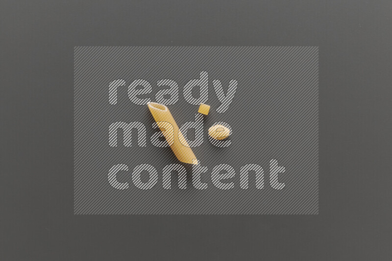Different pasta types on grey background
