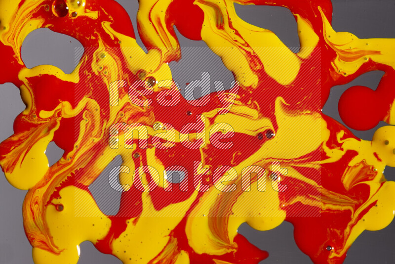 Abstract colorful background with mixed of red and yellow paint colors