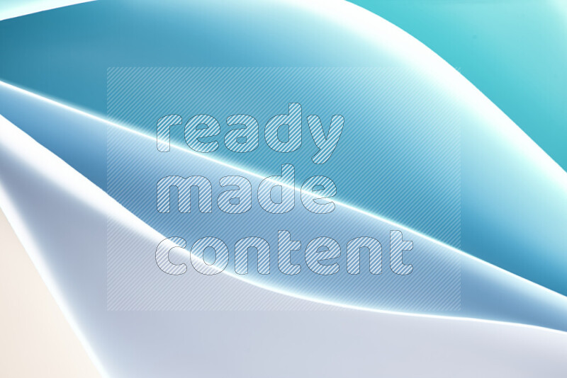 This image showcases an abstract paper art composition with paper curves in blue and white gradients created by colored light