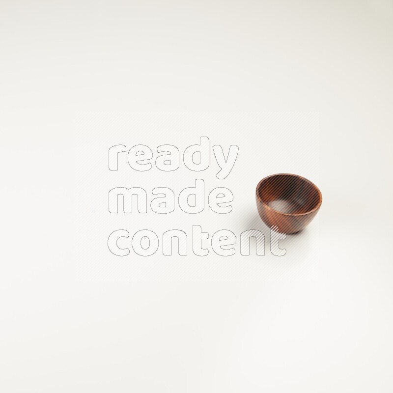 Wooden bowl on white background