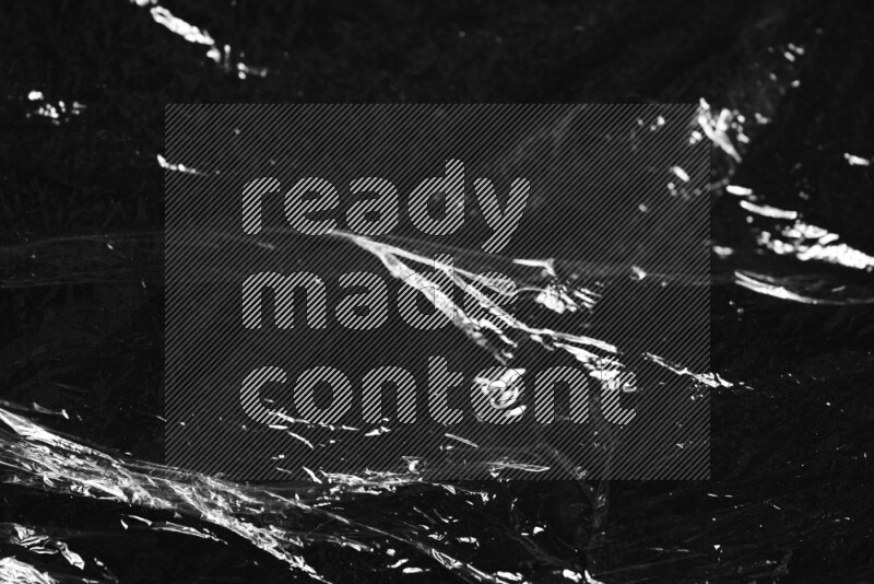Plastic wrap texture on black background