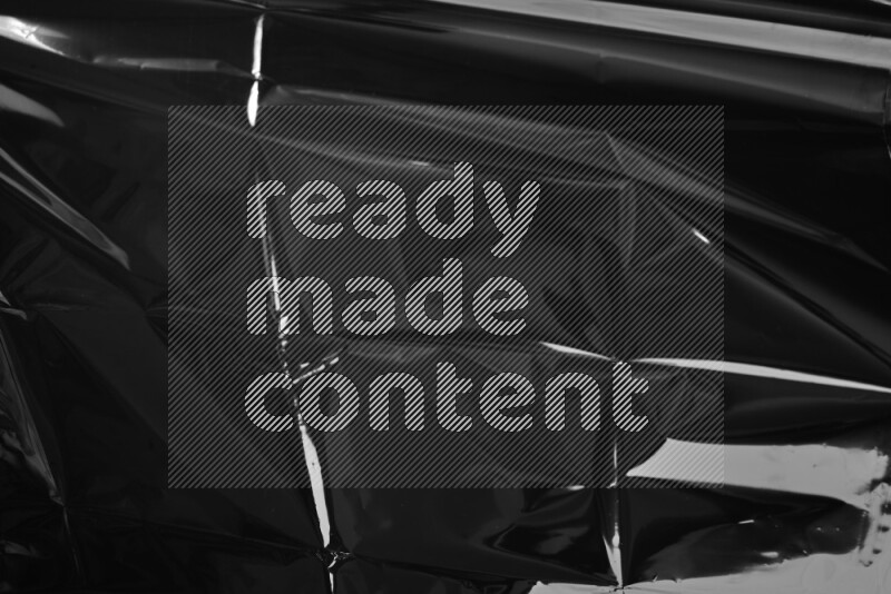 Plastic wrap texture on black background