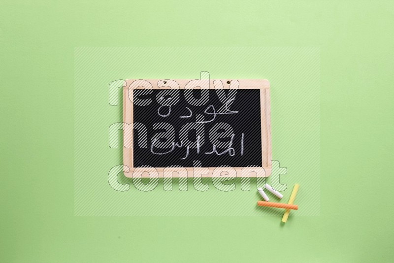 A blackboard on green background (back to school)