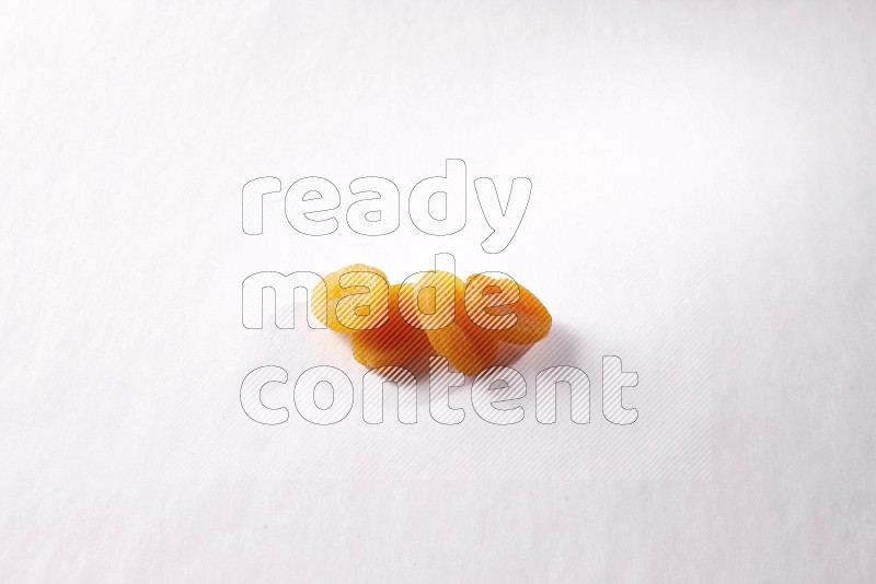 Dried apricots on white background