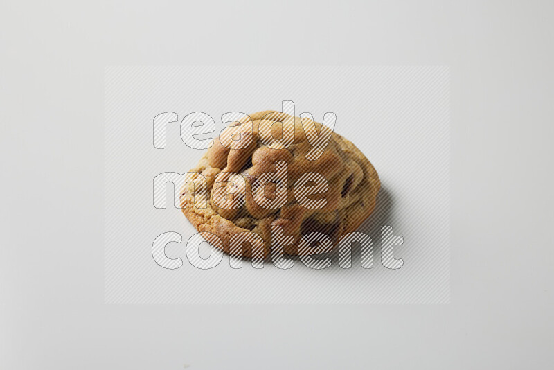 a chocolate chip cookie on a white background