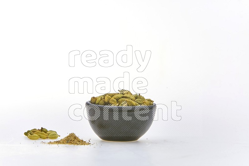 Cardamon in a container on white background