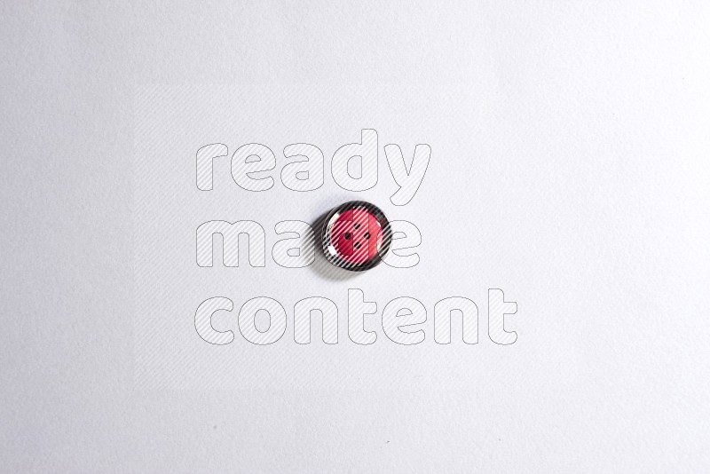 One colored button on grey background
