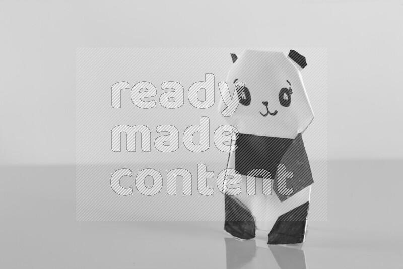 Origami animals on grey background