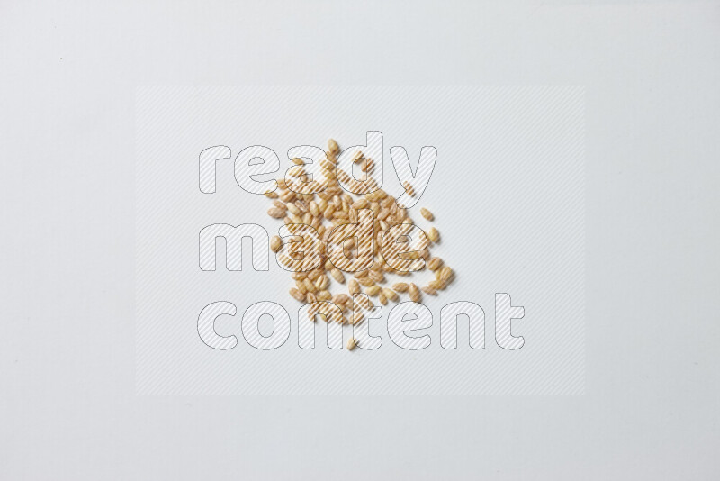 Hulled wheat on white background