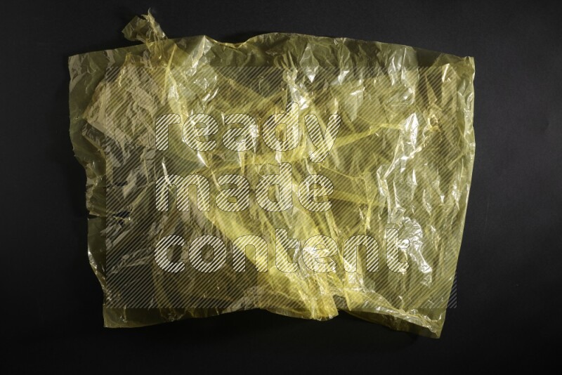 Colored plastic textures on black background