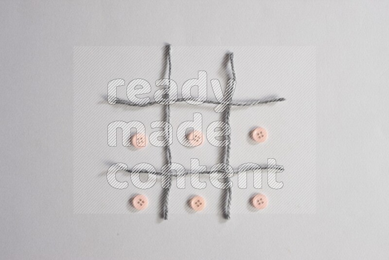 Rose buttons placed on grey background