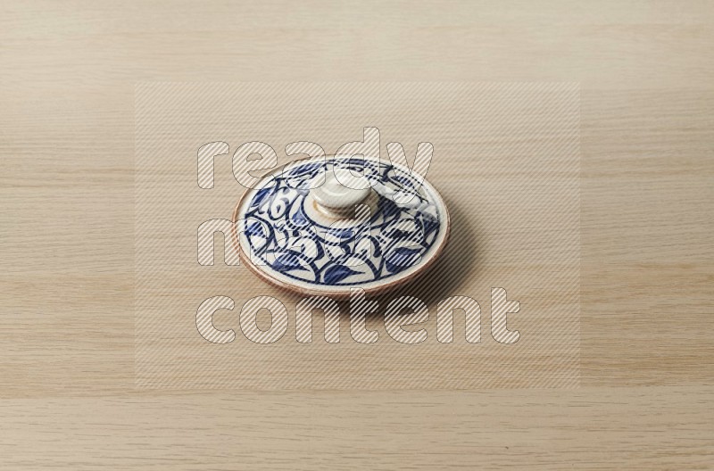 Multicolored Pottery Pot on Oak Wooden Flooring, 45 degrees