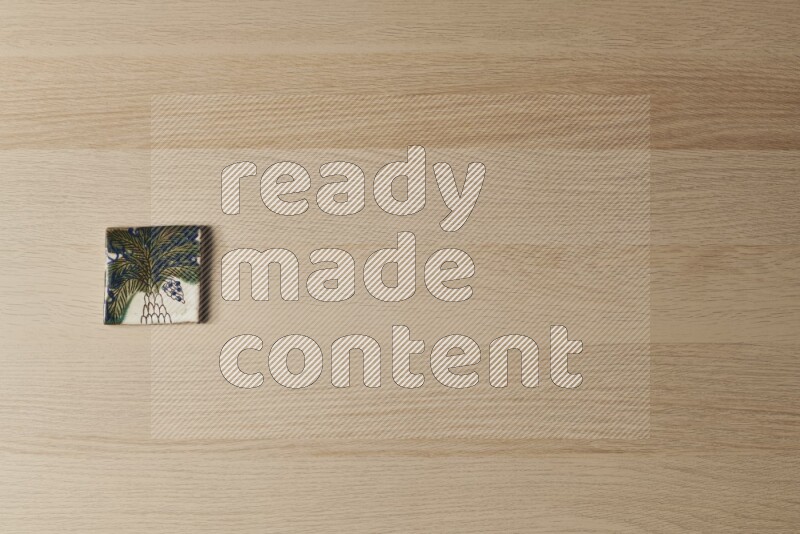 قواعد أكواب فخارية مزخرفة على خلفية خشبية فاتحة