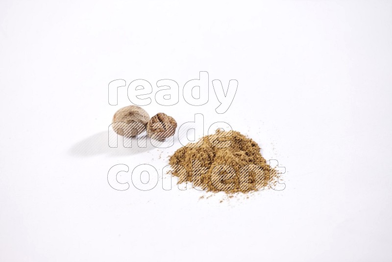 Nutmeg seeds with nutmeg powder beside it on a white flooring in different angles