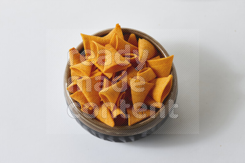 Assorted snacks on white background