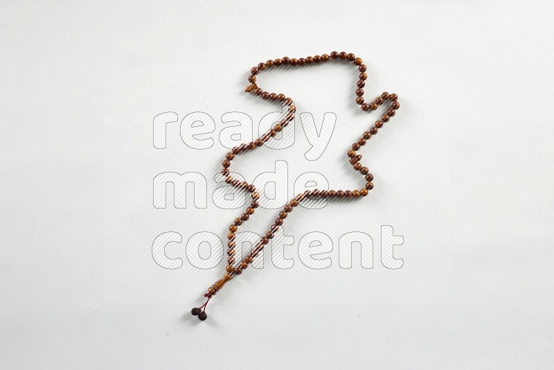 Prayer beads on white background